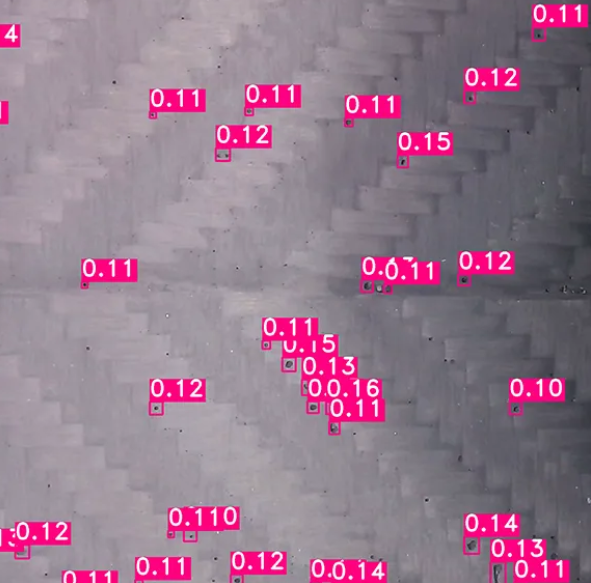 A pinhole detection image of a carbon fiber part with every pinhole detected, highlighted and measured