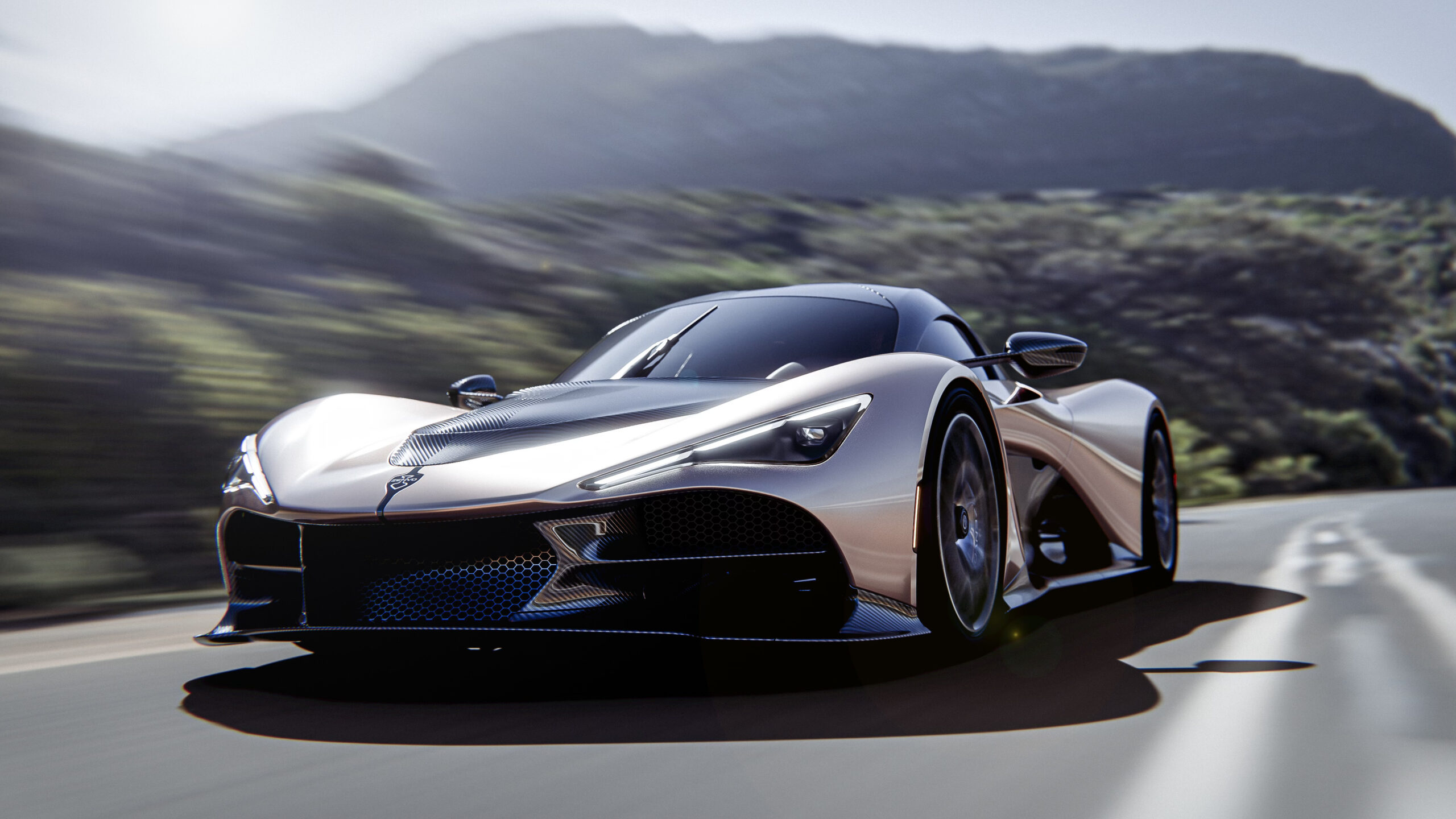 Zenvo Aurora hypercar driving on a mountain road, showing its aerodynamic carbon fiber bodywork and aggressive front design under natural light.