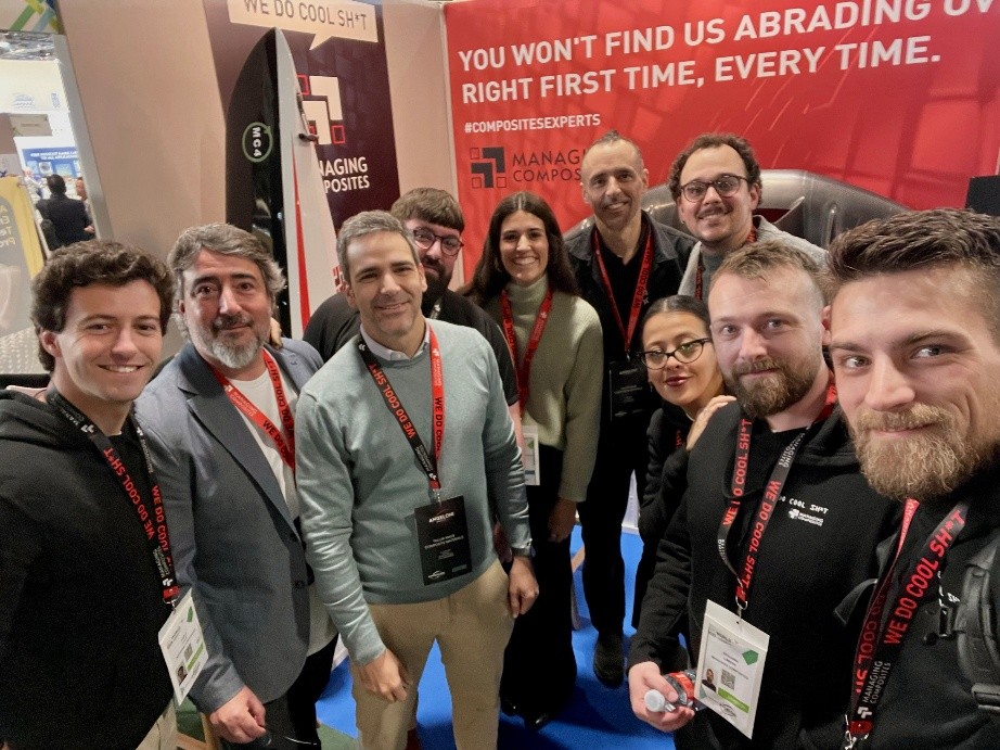 Several persons of the Managing Composites Team in ftont of their stand at JEC World 2025